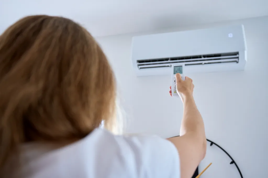 Mother setting the AC